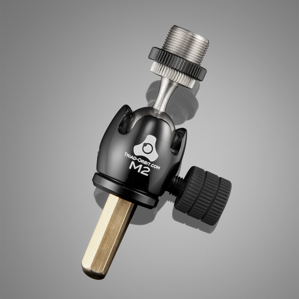 M2 orbital adapter features the exclusive Compass Point™ ball swivel housing that solidly secures microphones, cameras, and lights in position for precise directionality.